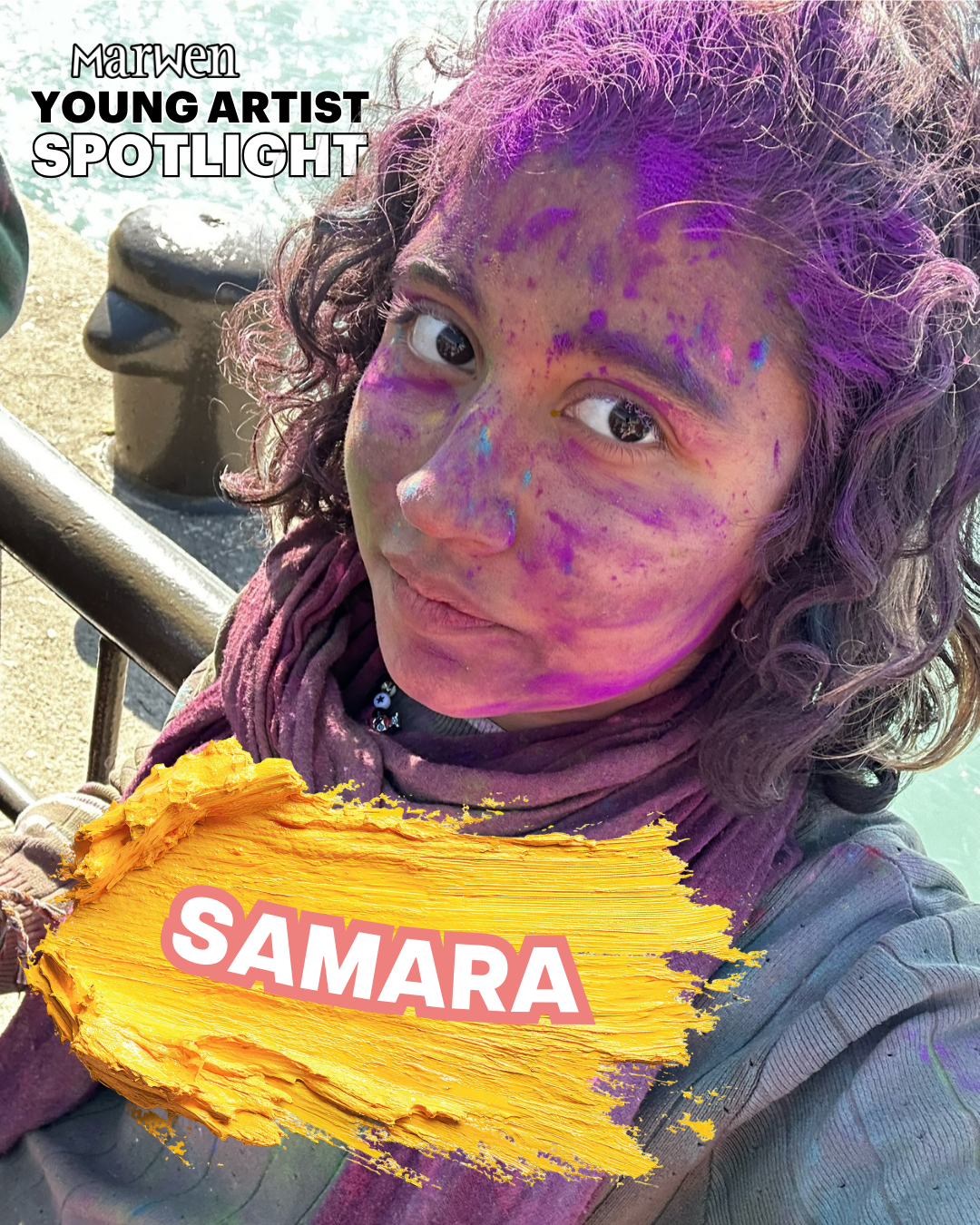 Young Artist Samara poses for the camera, covered in paint!