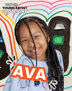 Portrait of Ava, a Marwen Middle School artist, in front of one of her colorful drawings.